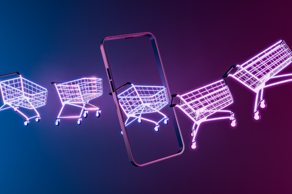 Mehrere Einkaufswägen sind zu sehen, bei denen es scheint, dass sie durch ein Mobiltelefon fahren