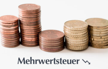 Umsatzsteuer Symbolbild Muenzen Roll und Pastuch
